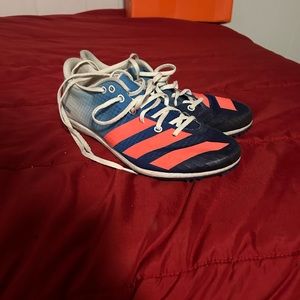 Adidas size 7 track cleats with spikes and bag